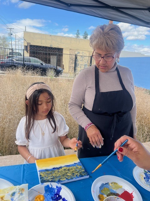 Young artist Avianna Arroyo explores her imagination as she paints under the guidance of Carmen Herrera.